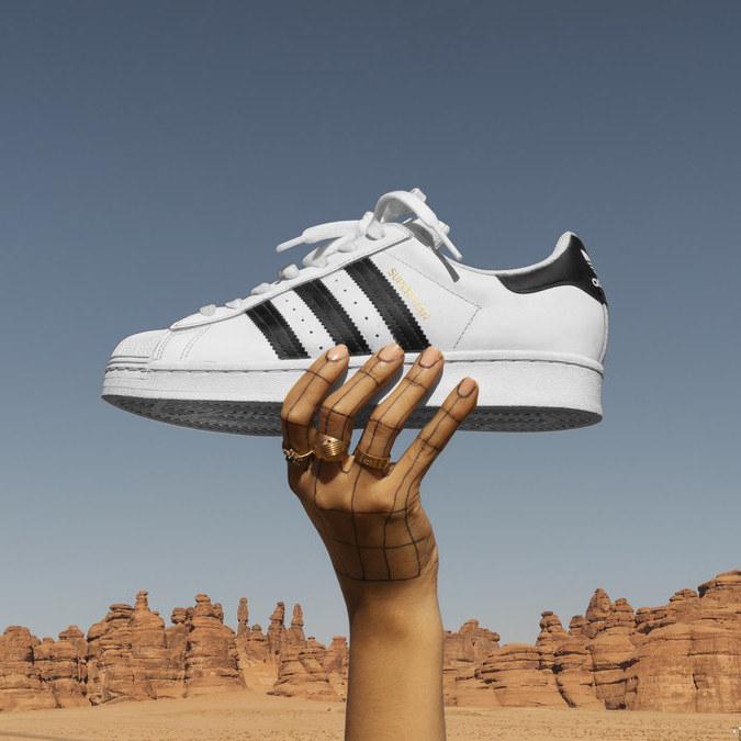 adidas nearly doubles e-commerce sales 