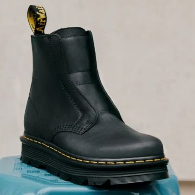Dr. Martens reports narrower losses in the first half